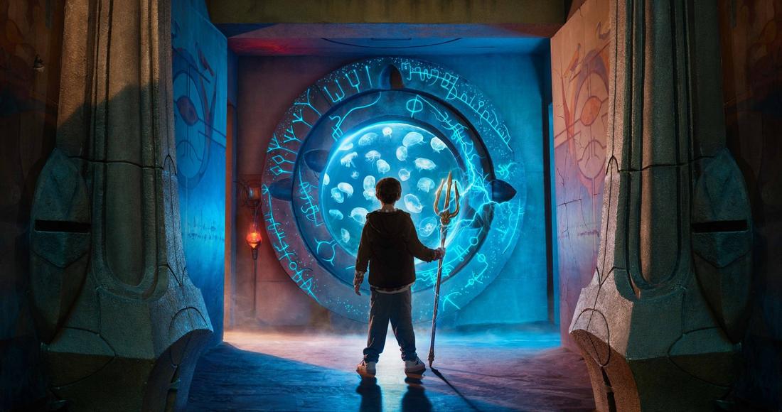 A child with the Interactive Trident at the Lost World Aquarium